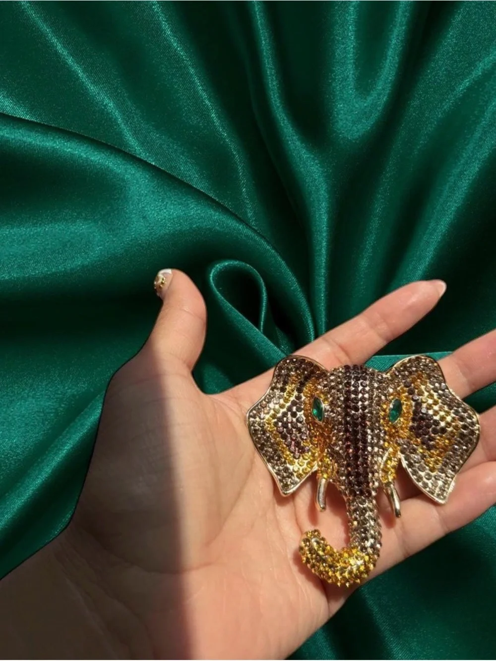 Gold-Tone Elephant Brooch with Green Eye Accents